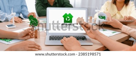 Reusable sign displayed on green business laptop while business team presenting green design to customer. ESG environment social governance and Eco conservative concept. Closeup. Delineation