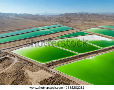 Aerial view of lithium fields or evaporation ponds in the Atacama desert, South America - a surreal, colorful landscape where batteries are born