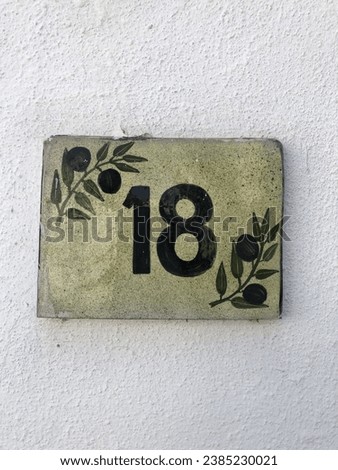 door number 18 with magnificent olive branch and olive picture logo and pattern