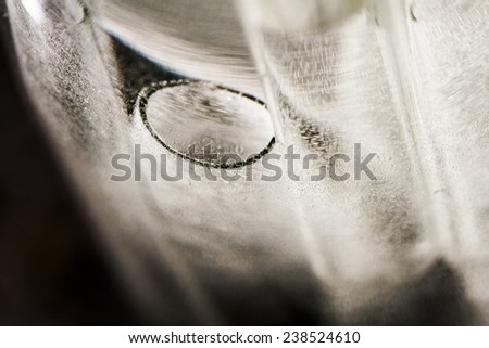 Black and white abstract underwater composition with bubbles, tubes, lines and light 