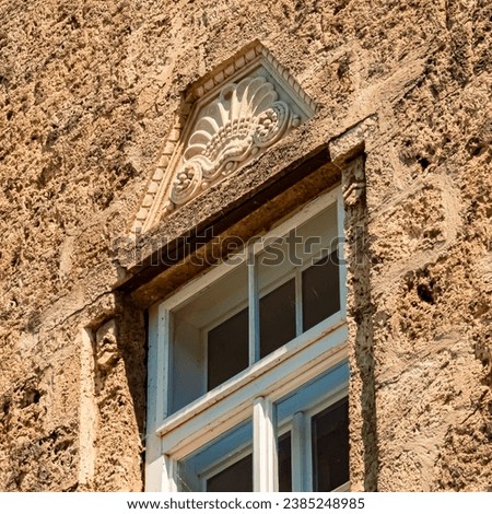 Details of a decorated window frame at Obernberg am Inn, Ried im Innkreis, Innviertel,Upper Austria, Austria