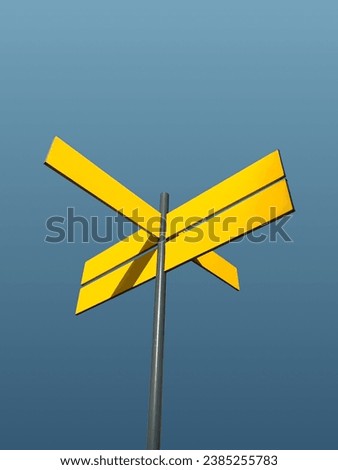 Yellow street sign or direction sign isolated on sky background. Template or mockup