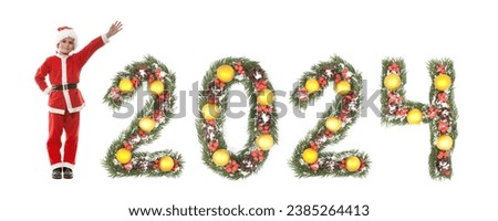 Boy dressed as Santa Claus and 2024 number made by christmas tree branches isolated on white background