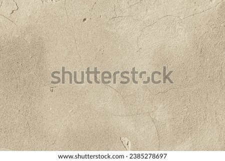 Texture of a cement rough painted wall with decorative elements as a background