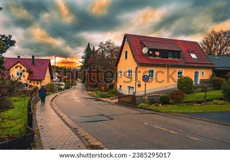 Rural evening autumn landscape during rain in the vicinity of the city of Nuremberg in Germany.