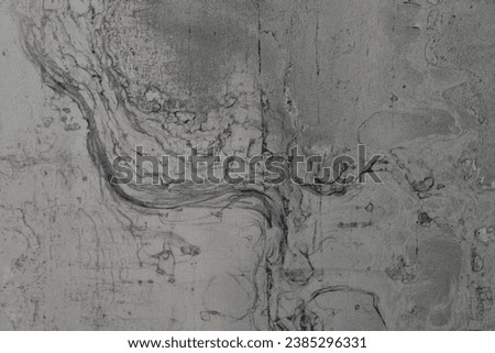 Grey marble background with gold pattern on surface. Texture of stone slab. Ceramic tiles for finishing floor. Graphic abstract background. Ceramic countertop.