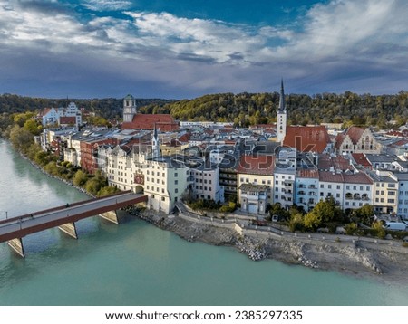 Romantic Bavarian town on the Inn river, panoramic aerial view
