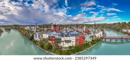 Romantic Bavarian town on the Inn river, panoramic aerial view Royalty-Free Stock Photo #2385297349