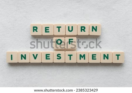 "return of investment" made with green letters. Concept of good ROI and making money Royalty-Free Stock Photo #2385323429