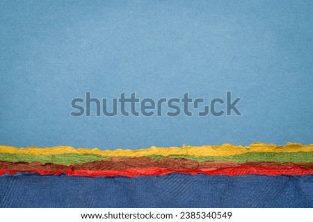 abstract landscape with a blue sky and ocean or sea - a collection of handmade textured art papers