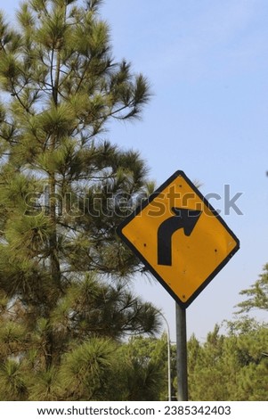 portrait of traffic signs on the side of the road