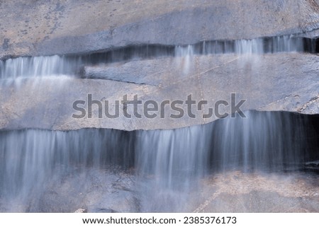 Water flowing at a beautiful waterfall
