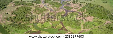 Aerial shot panorama of typical Pantanal Wetlands landscape with lagoons, forest, meadows, river, fi