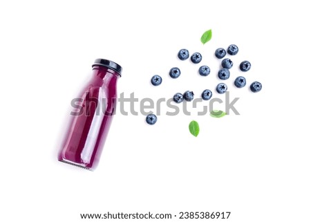 Blueberry juice in glass bottle with ripe blueberry fruits and green leaves  isolated on white background, Fresh Fruit, Healthy Fruit, Healthy Drink