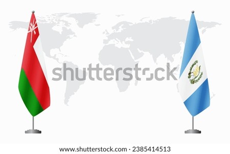 Oman and Guatemala flags for official meeting against background of world map.