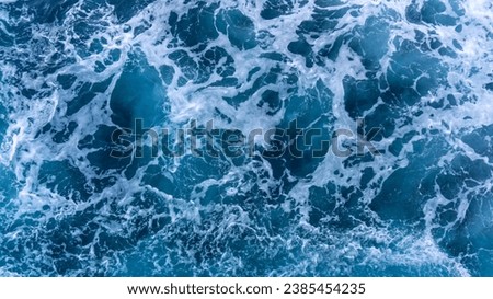 Top view of ocean sea water splashing. Seascape from high perspective