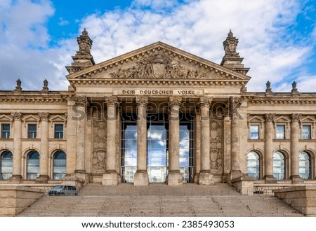 Reichstag building (Bundestag - parliament of Germany) in Berlin with translation "for German people" Royalty-Free Stock Photo #2385493053