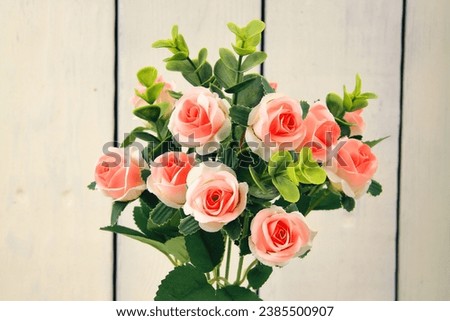 Roses are flowers. Bouquet of saffron, chrysanthemums, lilies, tulips.On a wooden background.For my birthday. Valentine's Day. for weddings.The concept of the holiday.For the designer.postcards 