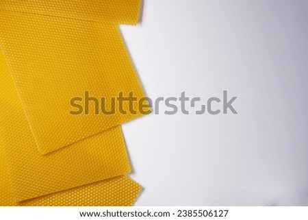 Set of honey voshchina of wax honeycomb from a bee hive for filled with honey on white background. Voshchina an artificial basis for the construction of honeycombs, sheet of wax of the cells.Top view.