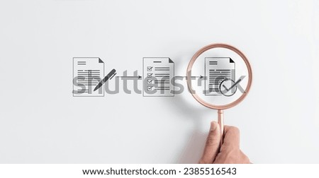 Magnifying glass focus to Approve document icon on white background for business process workflow illustrating management approval and and project approve concept. Royalty-Free Stock Photo #2385516543