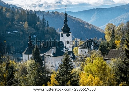 Spania Dolina village, Slovak republic. Religious architecture. Autumn natural scenery. Royalty-Free Stock Photo #2385519553