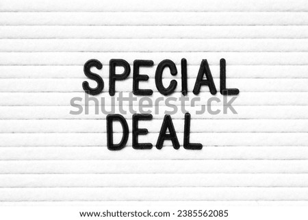 Black color letter in word special deal on white felt board background