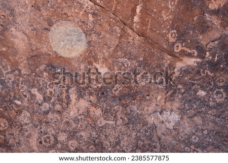 Petroglyphs are rock carvings (rock paintings)made by pecking directly on the rock surface using a stone chisel and a stone hammer.