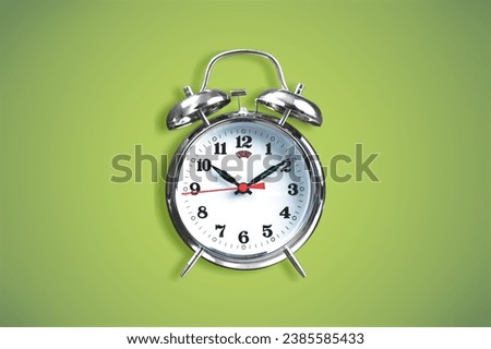 Small alarm clock, numbers, set the time placed on a table.