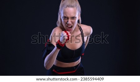 Runner running. Athlete sprinter run. Fit woman Influencer on black background. Download photo for advertising a fitness club in social networks. Cover for sport motivation music or video.