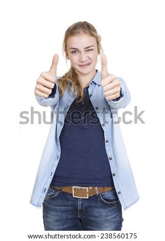 youthful girl with blond hair showing thumbs up