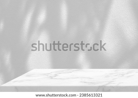 Minimal White Marble Table Corner with Tree Shadow on Concrete Wall Background, Suitable for Product Presentation Backdrop, Display, and Mock up.