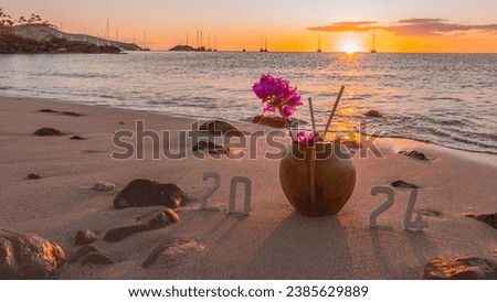 Happy New Year 2024: New Year 2024 concept with a sunrise on a Caribbean beach and the numbers 2024.