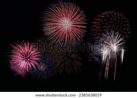 HAPPY NEW YEAR - New Year's Eve, Silvester 2023 holiday background banner panorama long greeting card - Colorful firework fireworks oon dark night sky