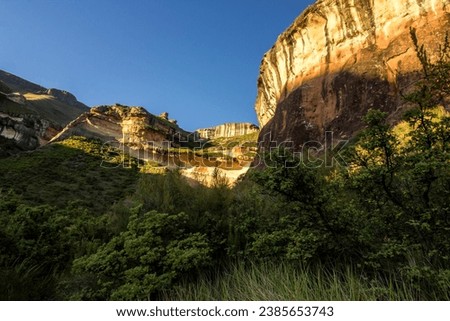The sandstone cliffs of Golden Gate Highlands National Park in the Free State Drakensberg of South Africa, late afternoon on a clear sunny day.