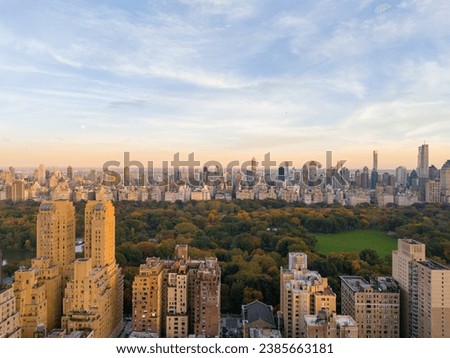 Aerial photo New York Central Park. View of highrise condominium buildings and fall foliage