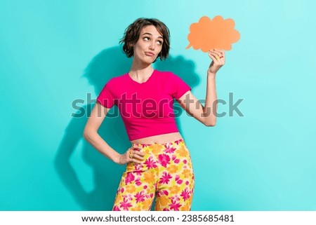 Photo of minded pensive person look hand hold empty space cloud shape card contemplate isolated on teal color background