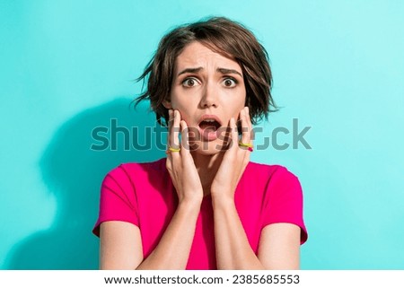 Photo of unsatisfied frightened unsatisfied girl hands touch cheekbones open mouth isolated on teal color background Royalty-Free Stock Photo #2385685553
