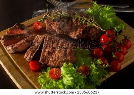 steaks with vegetables and rosemary