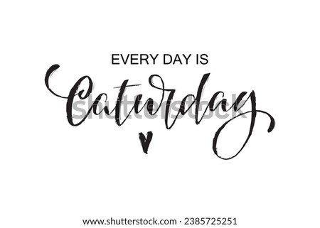 Everyday is caturday handwritten text, modern brush ink calligraphy, hand lettering typography. Funny quote for photo overlays, greeting card or print, poster design. World cat's day.  Royalty-Free Stock Photo #2385725251