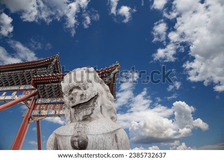 Stone Guardian Lion Statue in Beihai Park -- is an imperial garden to the northwest of the Forbidden City in Beijing, China