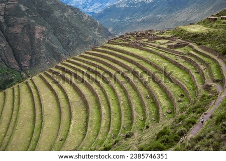 Pisac Inca terraces, are an impressive set of ancient agricultural terraces located near the town of Pisac in the Sacred Valley of the Incas in Peru. Royalty-Free Stock Photo #2385746351