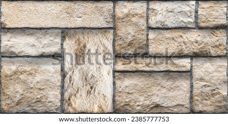 natural rustic stone wall cladding, beige brown elevation tile random design, exterior tiles, stone brick wall texture background backdrop  Royalty-Free Stock Photo #2385777753