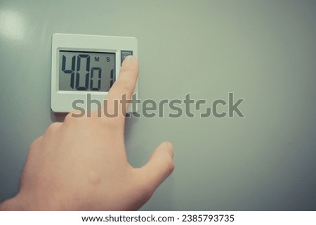 kitchen timer. Achieve precision in your culinary endeavors with these easy to use, programmable timers. Royalty-Free Stock Photo #2385793735