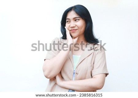 happy calm asian woman smiling confident wearing casual brown clothes isolated on white background