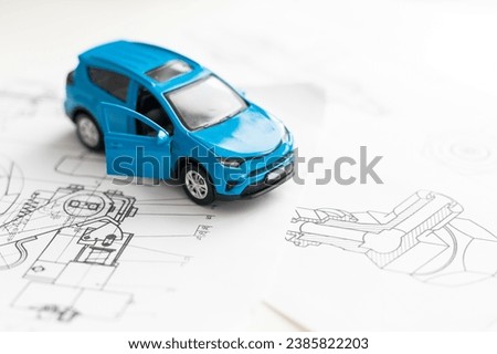 Finance commerce concept for car purchase loan or insurance. Image of blue car on white background. 