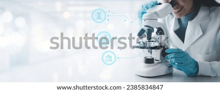 chemist is doing an experiment in the laboratory, A scientist is using a microscope to analyze the chemical composition, A scientific experiment is searching for biological answers in a laboratory.