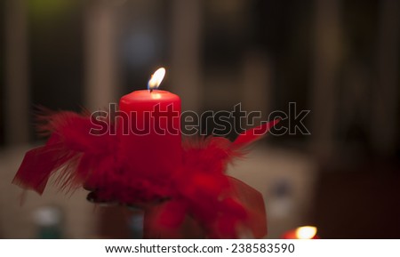 One candle flame at night