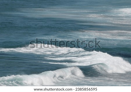 ocean wave crest and spray