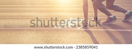 Male runner prepares to run on a treadmill. With text starting the year 2024 in new year start concept. Towards the goal of success Royalty-Free Stock Photo #2385859041