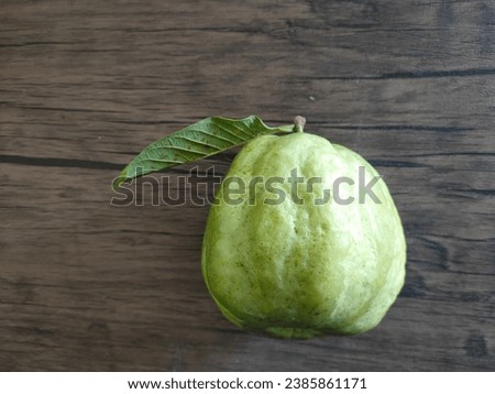 Guava placed on a wooden table